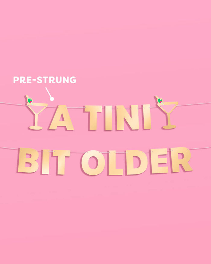 Tini Bit Older Banner - gold foil banner